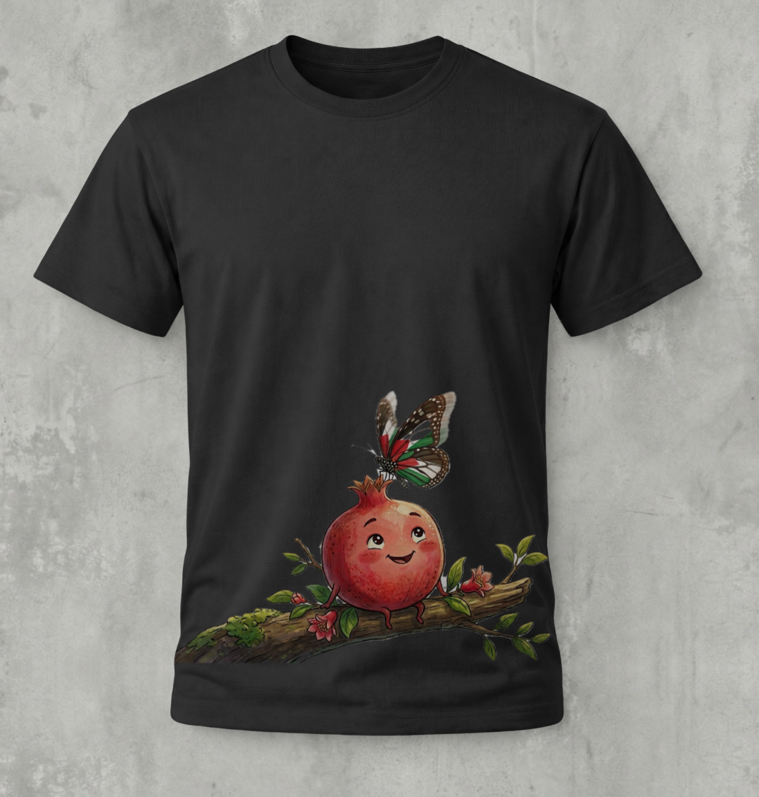 Black t-shirt with a pomegranate and butterfly design on a concrete surface